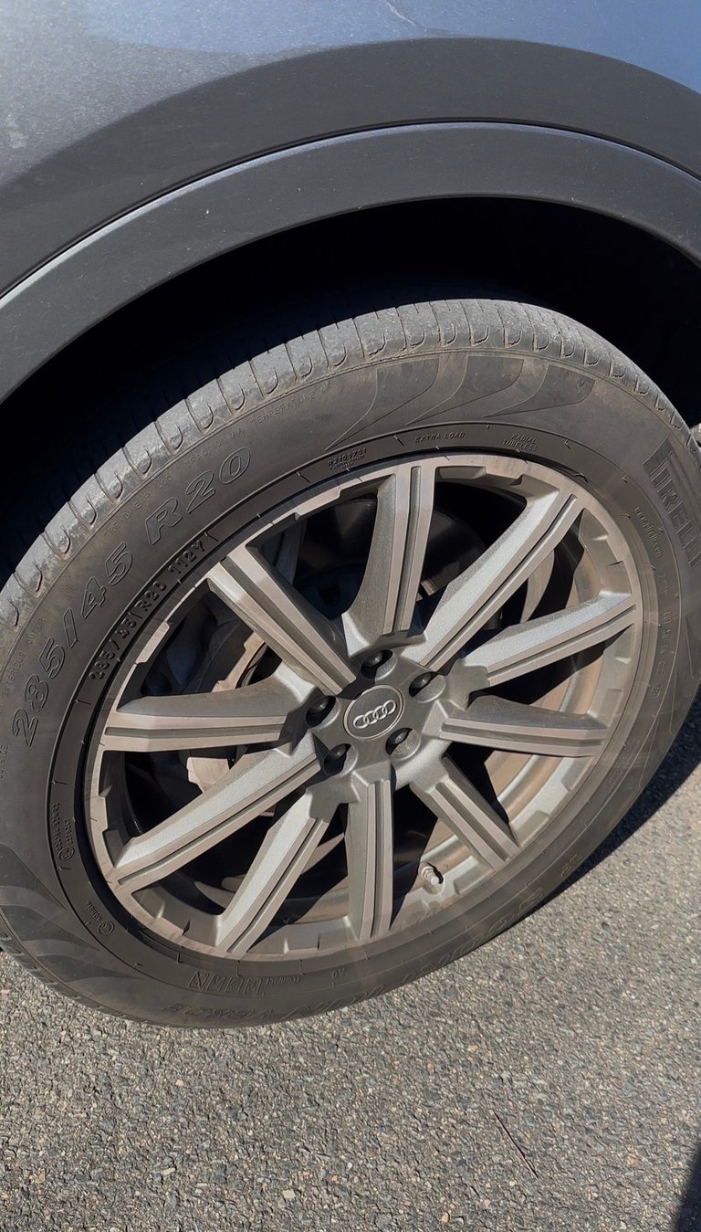 Clean silver alloy wheel with multi-spoke design after detail